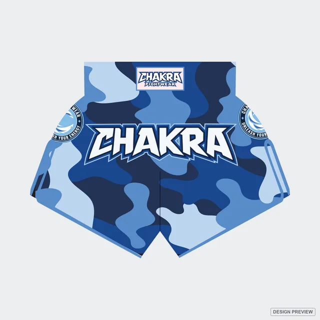 Design preview, front: blue camouflage CHAKRA shorts with a large white CHAKRA wordmark